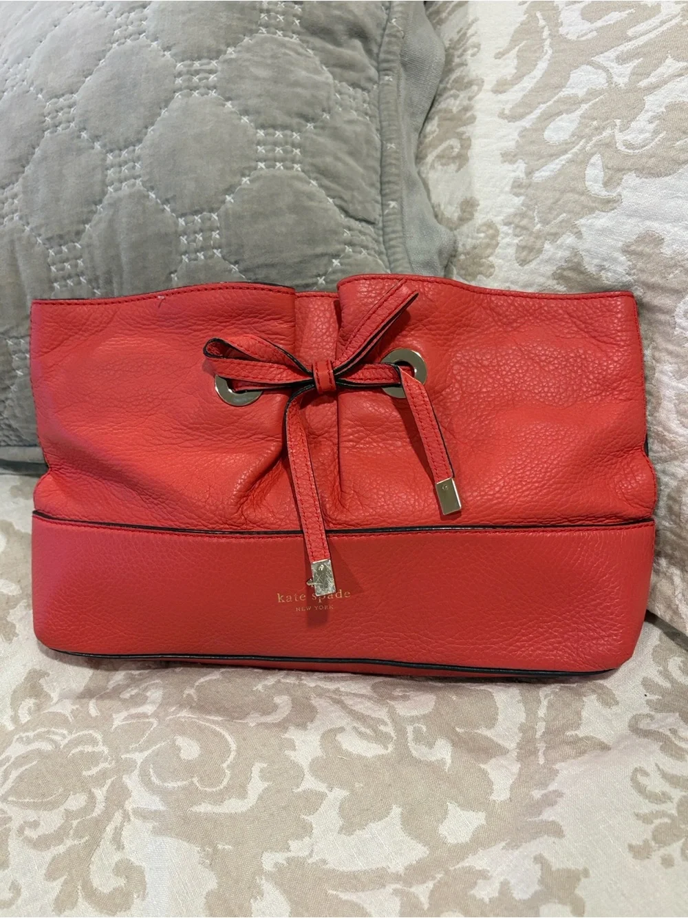 Kate Spade New York West Valley Vilma Pebbled Leather Bow Clutch Coral Red
